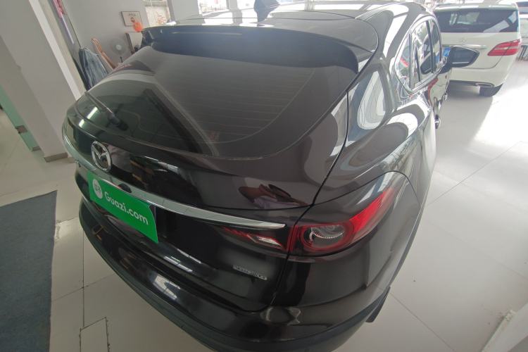 Used Mazda CX-4 2021 2.0L Automatic Two-Wheel Drive Blue Sky Dynamic Edition Rear Right 45 Deg