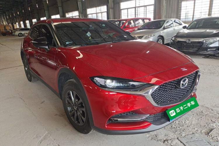 Used Mazda CX-4 2021 2.0L Automatic Two-Wheel Drive Blue Sky Dynamic Edition Front Right 45 Deg