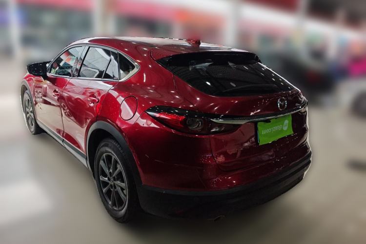 Used Mazda CX-4 2021 2.0L Automatic Two-Wheel Drive Blue Sky Dynamic Edition Rear Left 45 Deg