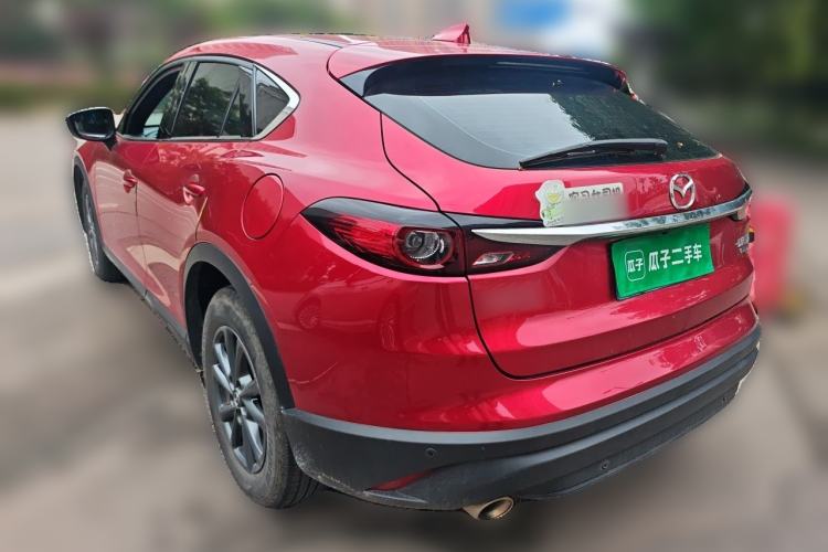 Used Mazda CX-4 2021 2.0L Automatic Two-Wheel Drive Blue Sky Dynamic Edition Rear Left 45 Deg