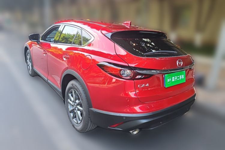 Used Mazda CX-4 2021 2.0L Automatic Two-Wheel Drive Blue Sky Exploration Edition Rear Left 45 Deg