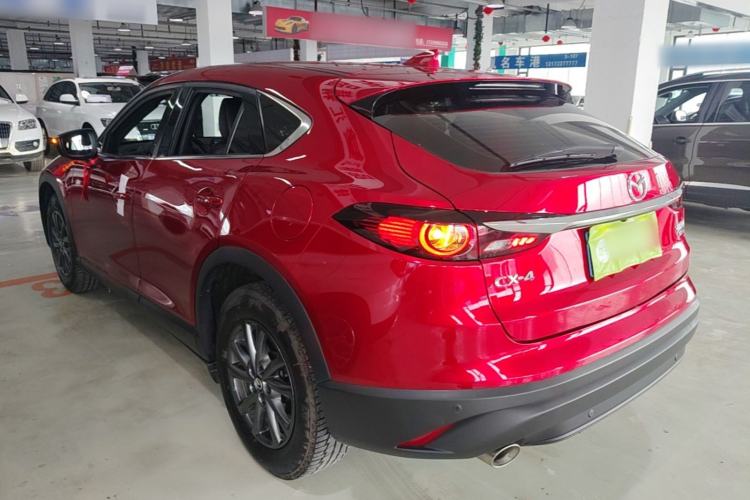 Used Mazda CX-4 2021 2.0L Automatic Two-Wheel Drive Blue Sky Dynamic Edition Rear Left 45 Deg