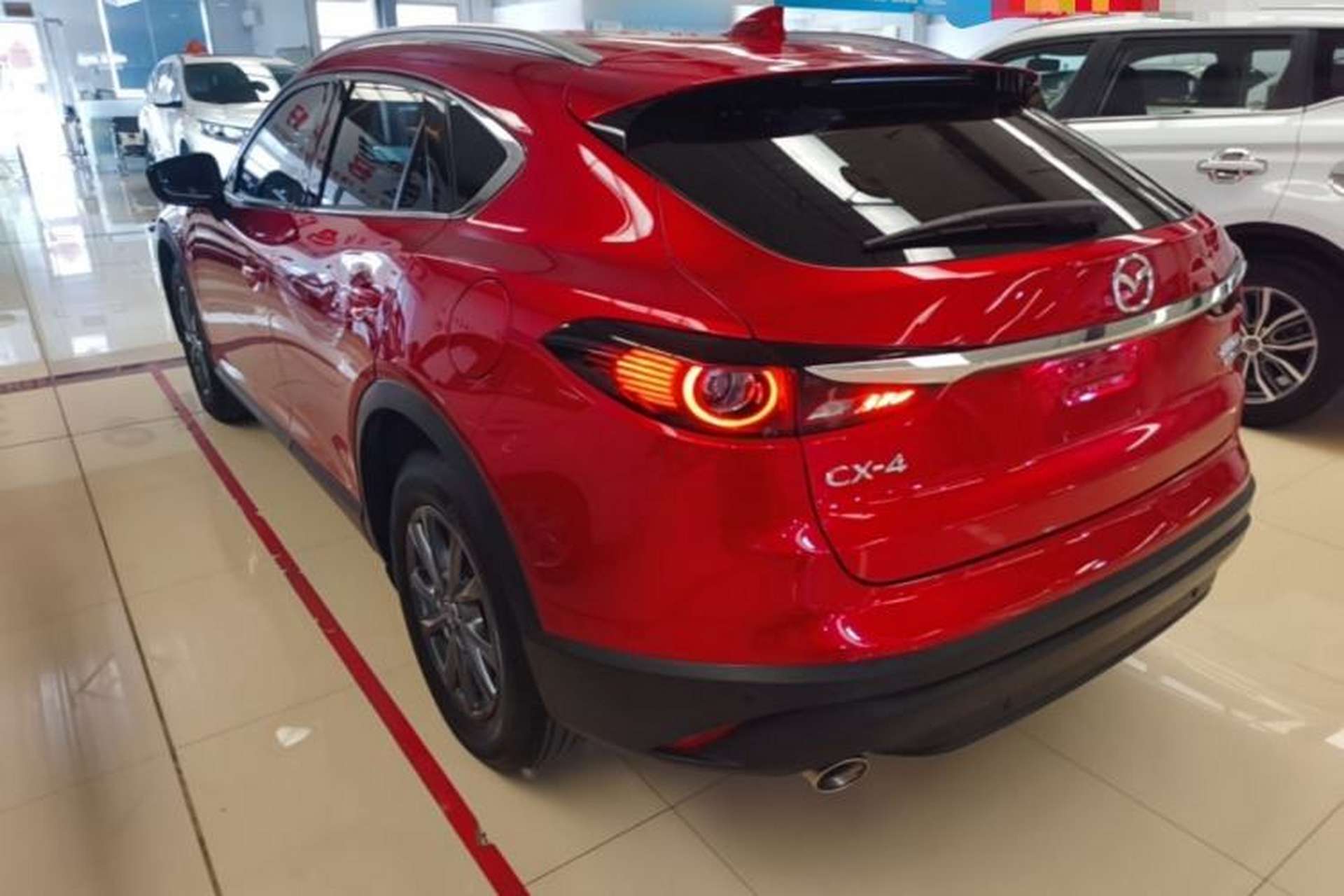Used Mazda CX-4 2021 2.0L Automatic Two-Wheel Drive Blue Sky Exploration Edition Rear Left 45 Deg