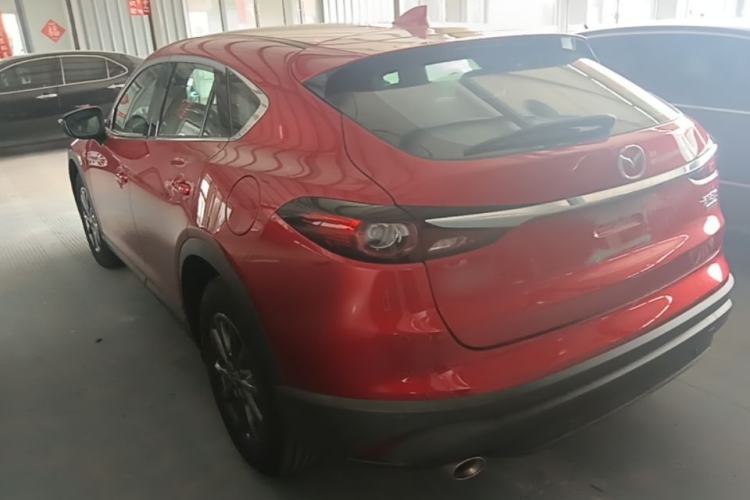 Used Mazda CX-4 2021 2.0L Automatic Two-Wheel Drive Blue Sky Dynamic Edition Rear Left 45 Deg