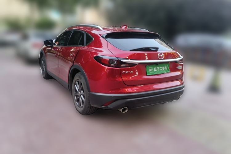 Used Mazda CX-4 2021 2.0L Automatic Two-Wheel Drive Blue Sky Dynamic Edition Rear Left 45 Deg