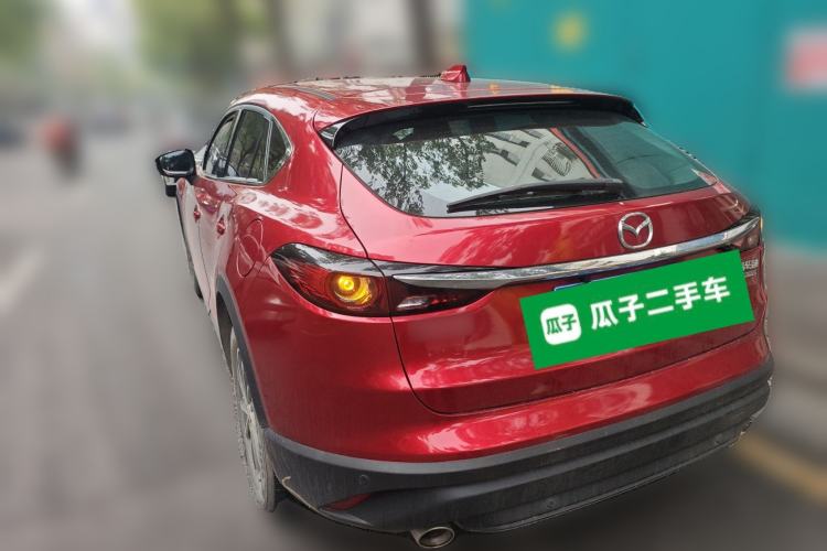 Used Mazda CX-4 2021 2.0L Automatic Two-Wheel Drive Blue Sky Dynamic Edition Rear Left 45 Deg