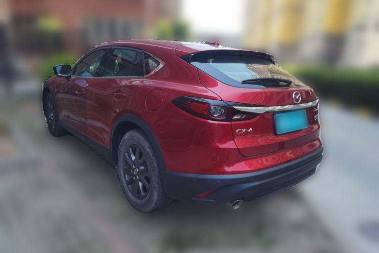 Used Mazda CX-4 2021 2.0L Automatic Two-Wheel Drive Blue Sky Exploration Edition Rear Left 45 Deg