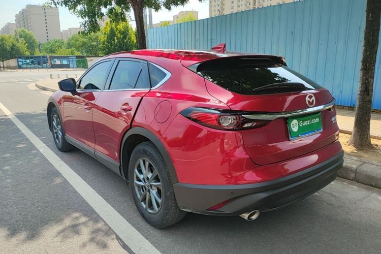 Used Mazda CX-4 2021 2.0L Automatic Two-Wheel Drive Blue Sky Dynamic Edition Rear Left 45 Deg