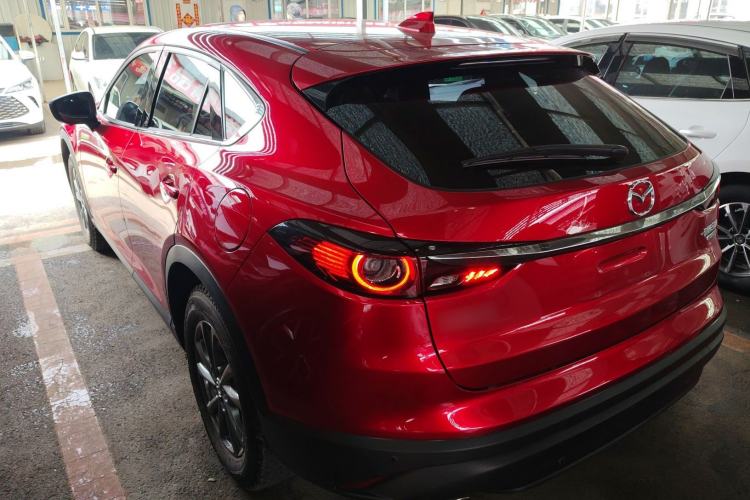 Used Mazda CX-4 2021 2.0L Automatic Two-Wheel Drive Blue Sky Dynamic Edition Rear Left 45 Deg