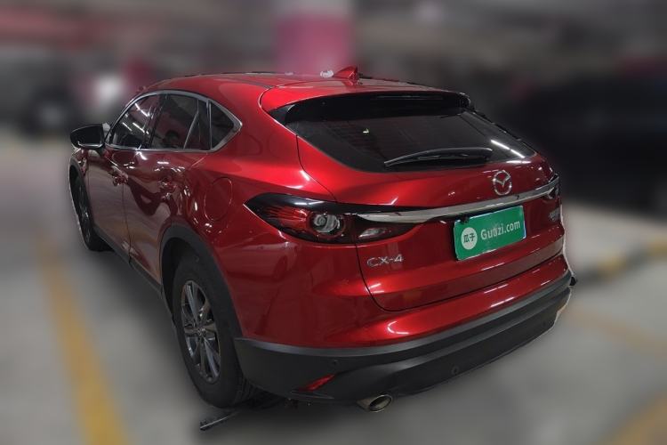 Used Mazda CX-4 2021 2.0L Automatic Two-Wheel Drive Blue Sky Dynamic Edition Rear Left 45 Deg