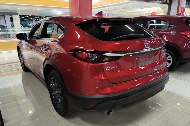 Used Mazda CX-4 2021 2.0L Automatic Two-Wheel Drive Blue Sky Exploration Edition Rear Left 45 Deg