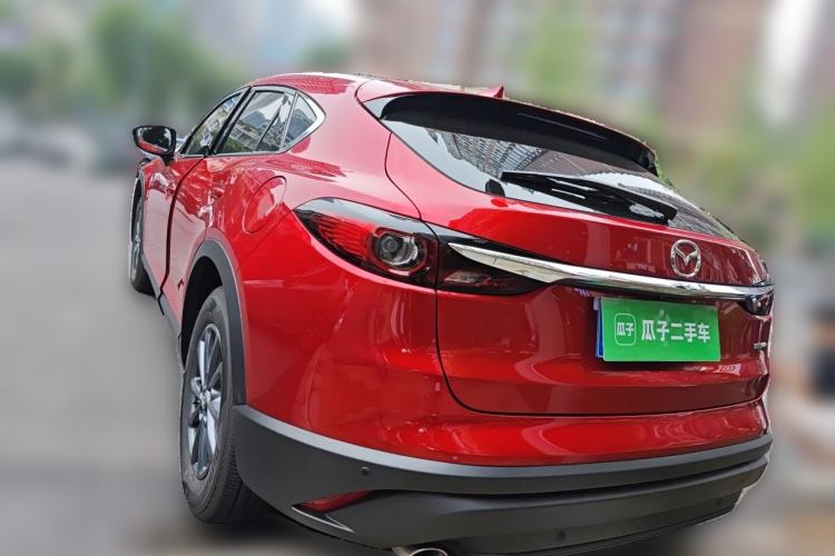 Used Mazda CX-4 2021 2.0L Automatic Two-Wheel Drive Blue Sky Dynamic Edition Rear Left 45 Deg