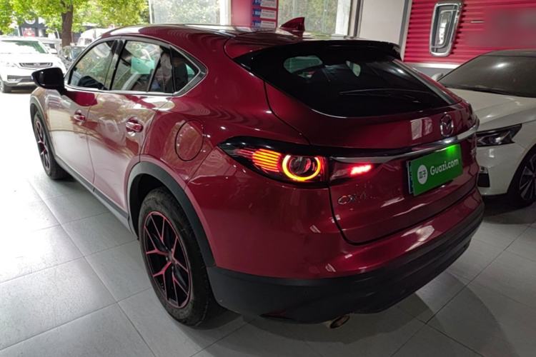 Used Mazda CX-4 2021 2.0L Automatic Two-Wheel Drive Blue Sky Dynamic Edition Rear Left 45 Deg