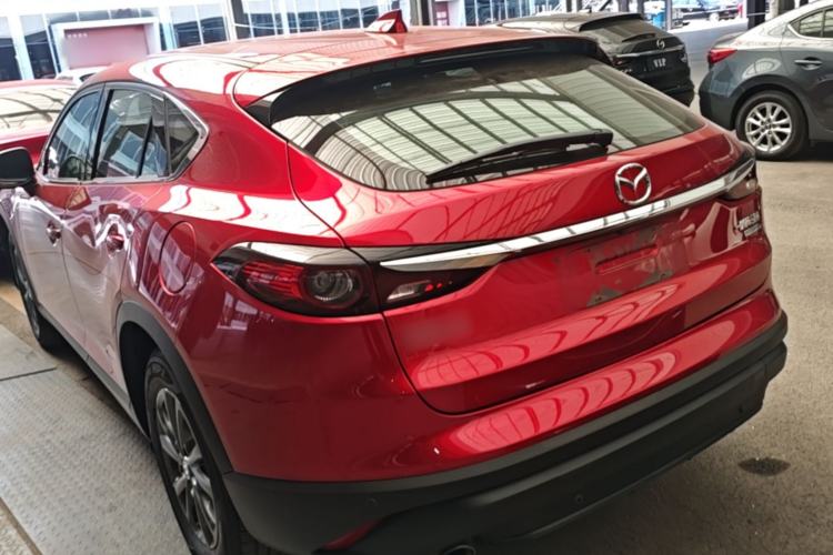 Used Mazda CX-4 2021 2.0L Automatic Two-Wheel Drive Blue Sky Exploration Edition Rear Left 45 Deg