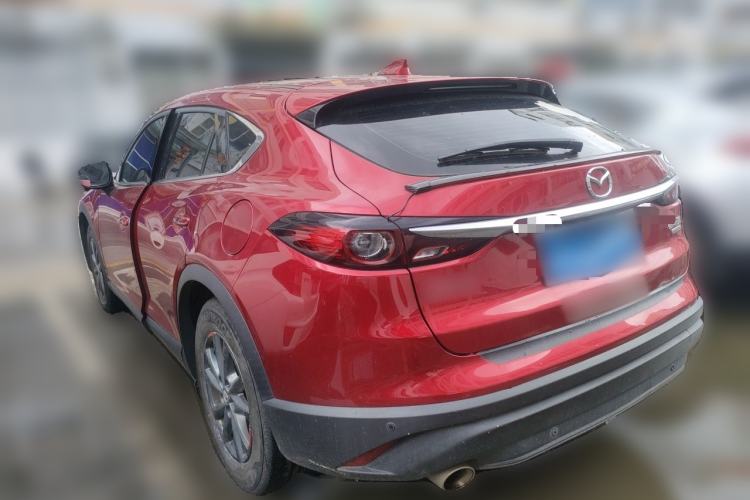 Used Mazda CX-4 2021 2.0L Automatic Two-Wheel Drive Blue Sky Dynamic Edition Rear Left 45 Deg