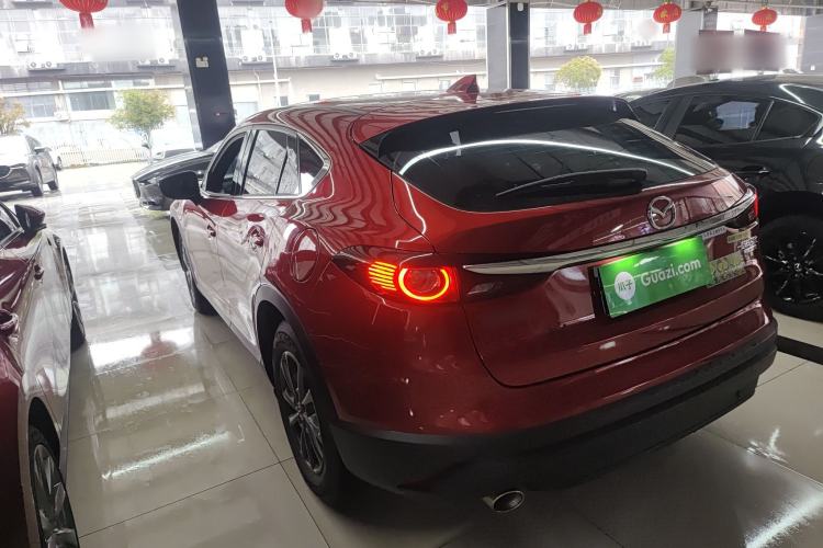 Used Mazda CX-4 2021 2.0L Automatic Two-Wheel Drive Blue Sky Exploration Edition Rear Left 45 Deg