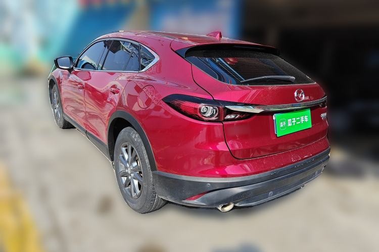 Used Mazda CX-4 2021 2.0L Automatic Two-Wheel Drive Blue Sky Dynamic Edition Rear Left 45 Deg