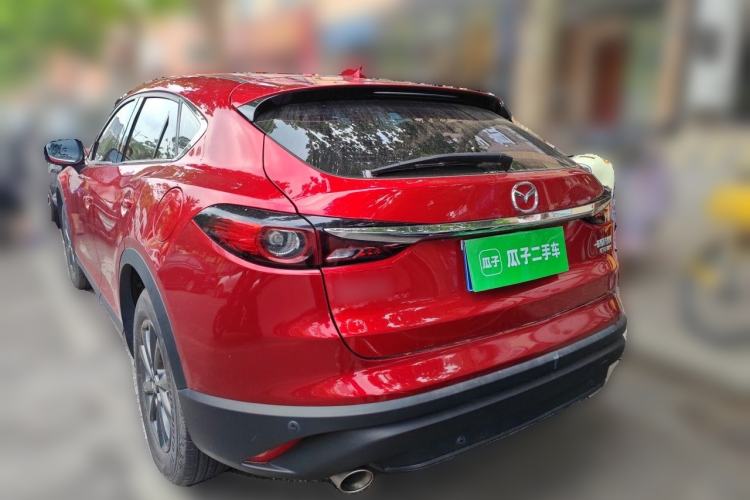Used Mazda CX-4 2021 2.0L Automatic Two-Wheel Drive Blue Sky Dynamic Edition Rear Left 45 Deg