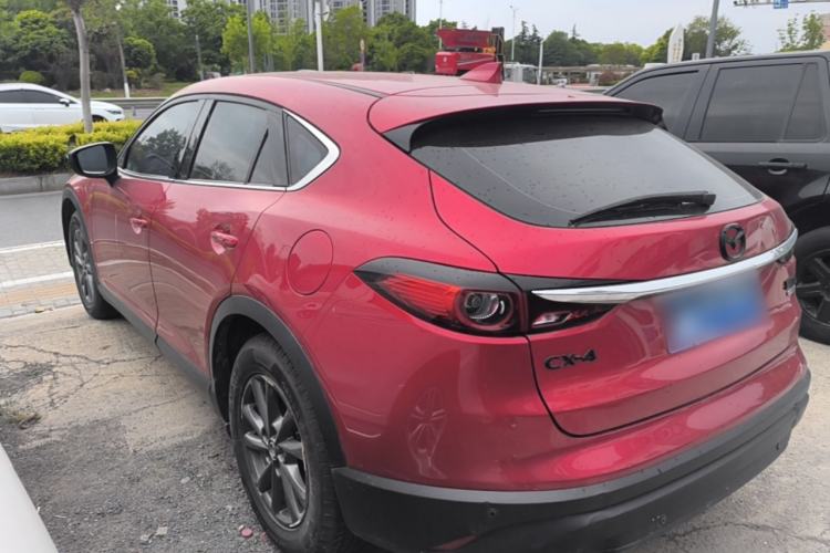 Used Mazda CX-4 2021 2.0L Automatic Two-Wheel Drive Blue Sky Exploration Edition Rear Left 45 Deg