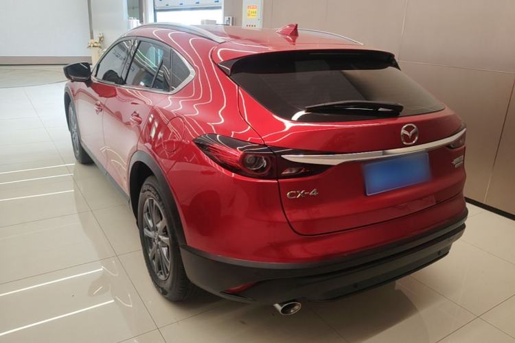 Used Mazda CX-4 2021 2.0L Automatic Two-Wheel Drive Blue Sky Dynamic Edition Rear Left 45 Deg