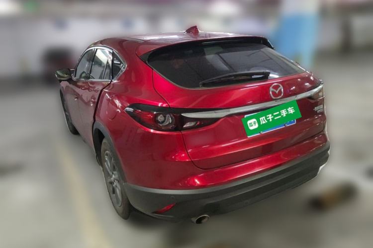 Used Mazda CX-4 2021 2.0L Automatic Two-Wheel Drive Blue Sky Dynamic Edition Rear Left 45 Deg