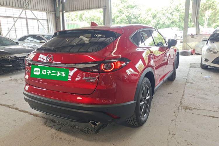 Used Mazda CX-4 2021 2.0L Automatic Two-Wheel Drive Blue Sky Dynamic Edition Rear Right 45 Deg