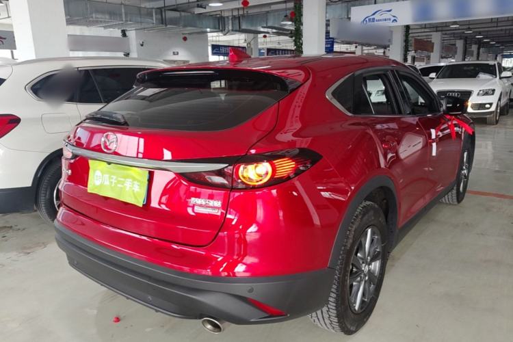 Used Mazda CX-4 2021 2.0L Automatic Two-Wheel Drive Blue Sky Dynamic Edition Rear Right 45 Deg