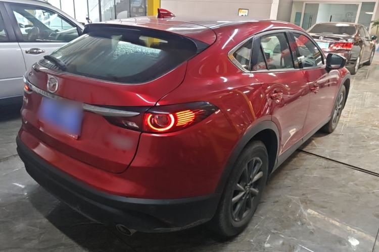 Used Mazda CX-4 2021 2.0L Automatic Two-Wheel Drive Blue Sky Dynamic Edition Rear Right 45 Deg
