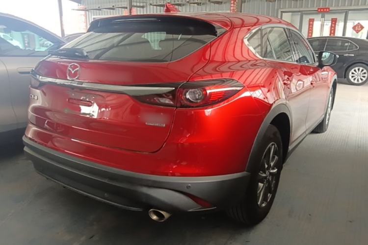 Used Mazda CX-4 2021 2.0L Automatic Two-Wheel Drive Blue Sky Dynamic Edition Rear Right 45 Deg