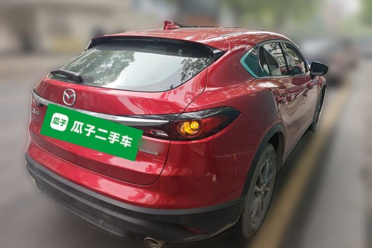 Used Mazda CX-4 2021 2.0L Automatic Two-Wheel Drive Blue Sky Dynamic Edition Rear Right 45 Deg