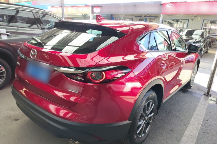 Used Mazda CX-4 2021 2.0L Automatic Two-Wheel Drive Blue Sky Dynamic Edition Rear Right 45 Deg