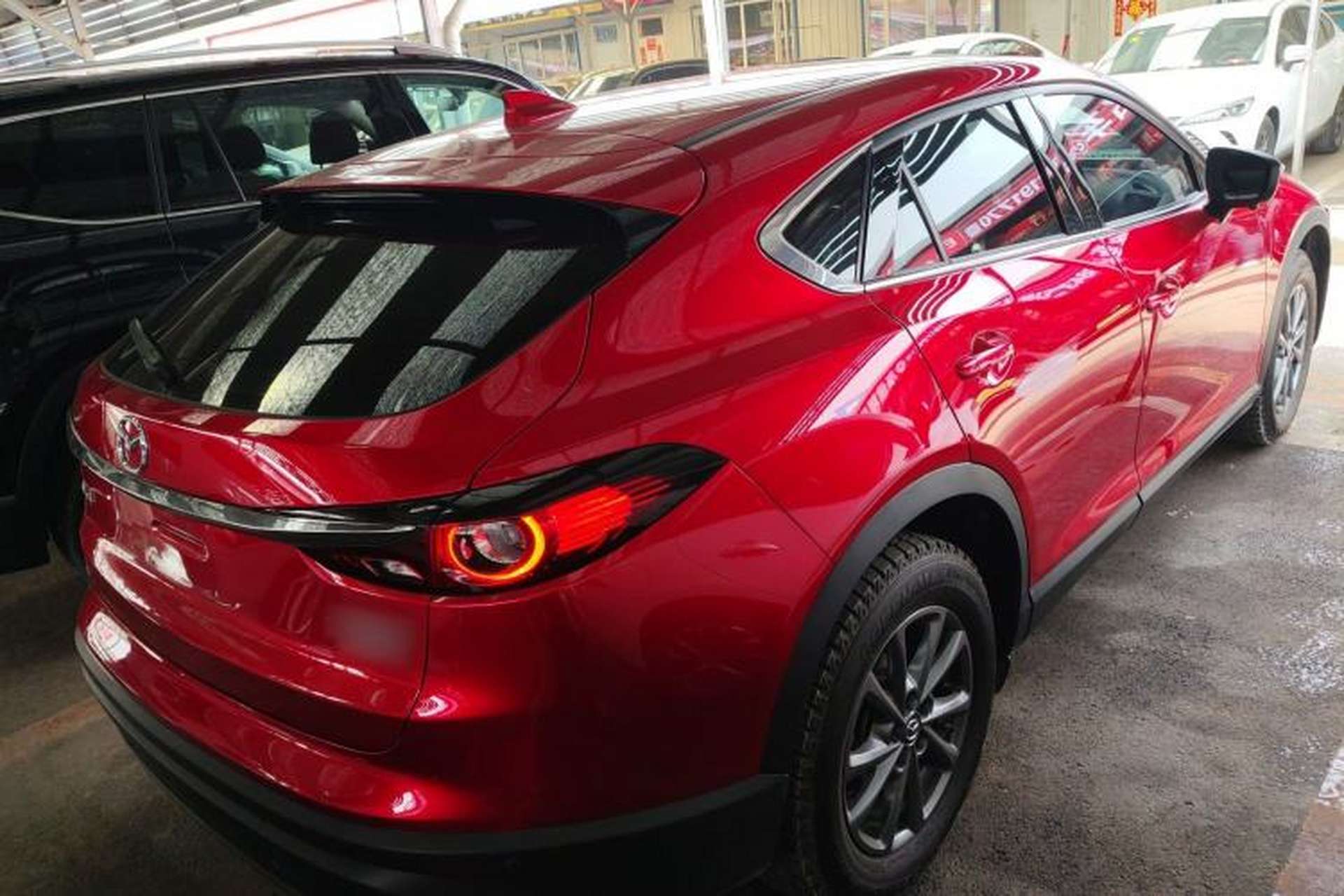 Used Mazda CX-4 2021 2.0L Automatic Two-Wheel Drive Blue Sky Dynamic Edition Rear Right 45 Deg