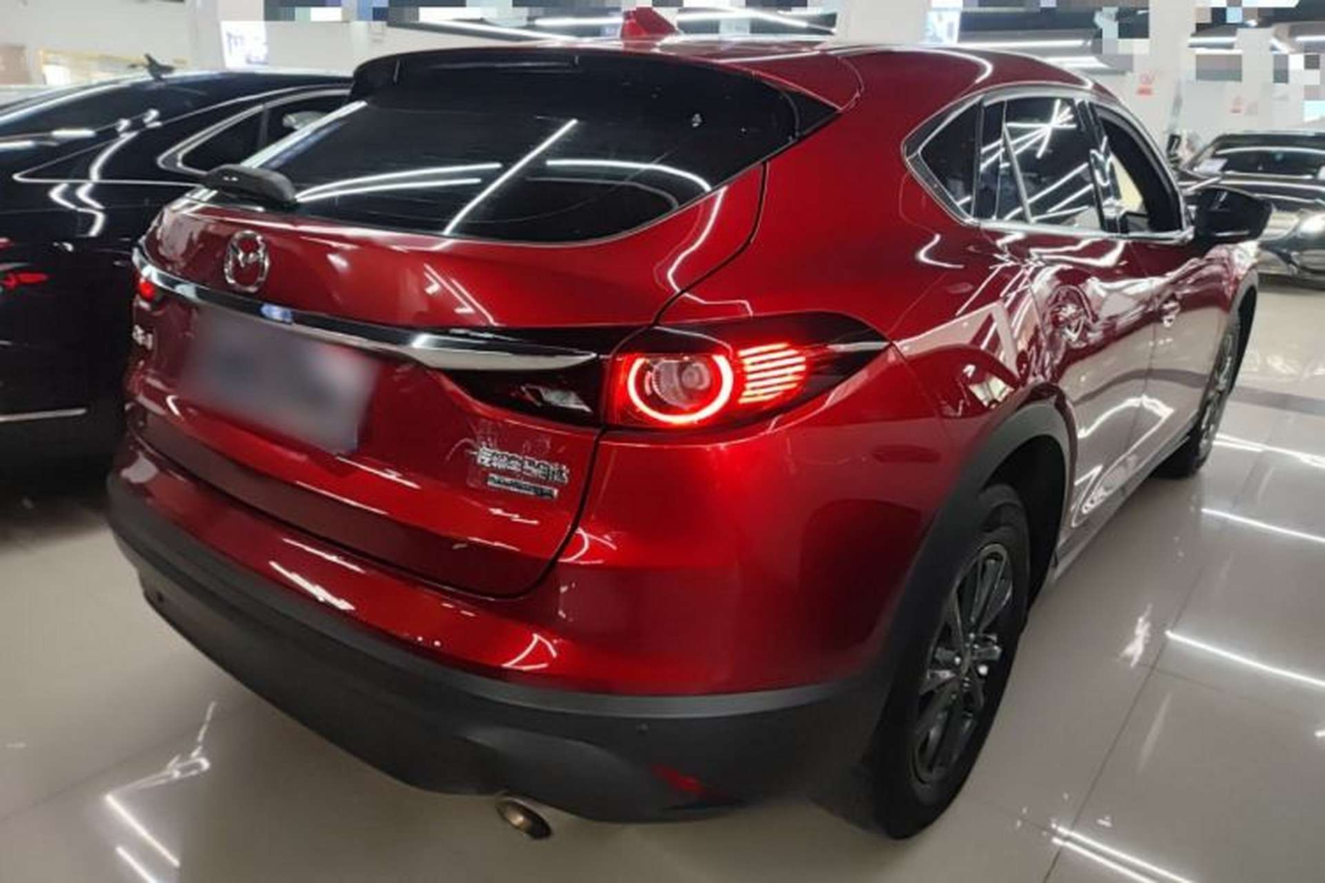 Used Mazda CX-4 2021 2.0L Automatic Two-Wheel Drive Blue Sky Exploration Edition Rear Right 45 Deg