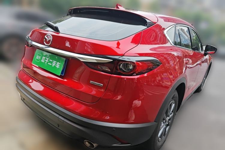 Used Mazda CX-4 2021 2.0L Automatic Two-Wheel Drive Blue Sky Dynamic Edition Rear Right 45 Deg