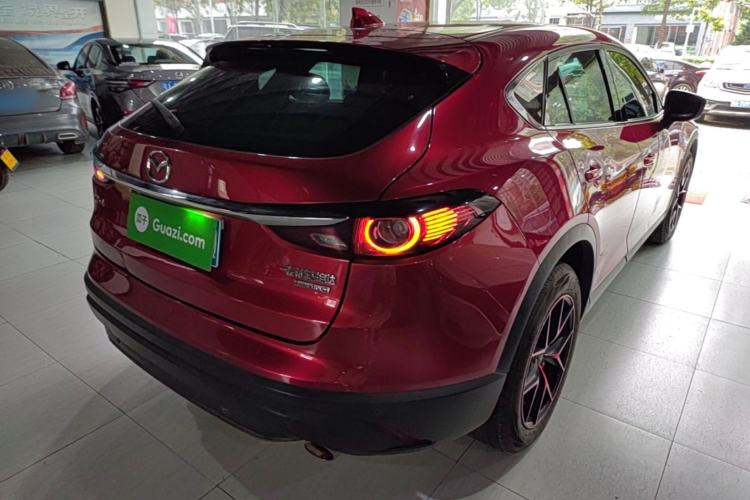 Used Mazda CX-4 2021 2.0L Automatic Two-Wheel Drive Blue Sky Dynamic Edition Rear Right 45 Deg