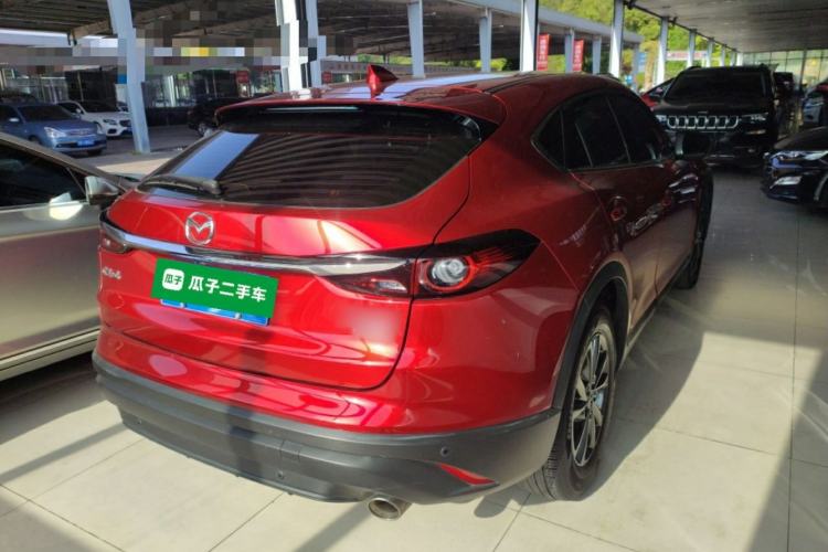Used Mazda CX-4 2021 2.0L Automatic Two-Wheel Drive Blue Sky Dynamic Edition Rear Right 45 Deg