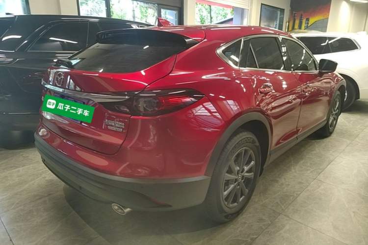 Used Mazda CX-4 2021 2.0L Automatic Two-Wheel Drive Blue Sky Dynamic Edition Rear Right 45 Deg