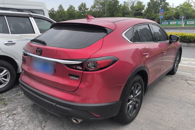 Used Mazda CX-4 2021 2.0L Automatic Two-Wheel Drive Blue Sky Exploration Edition Rear Right 45 Deg