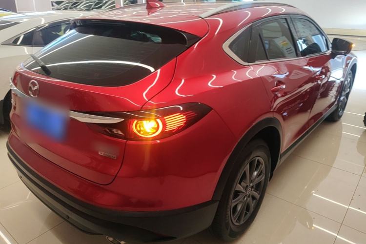 Used Mazda CX-4 2021 2.0L Automatic Two-Wheel Drive Blue Sky Dynamic Edition Rear Right 45 Deg
