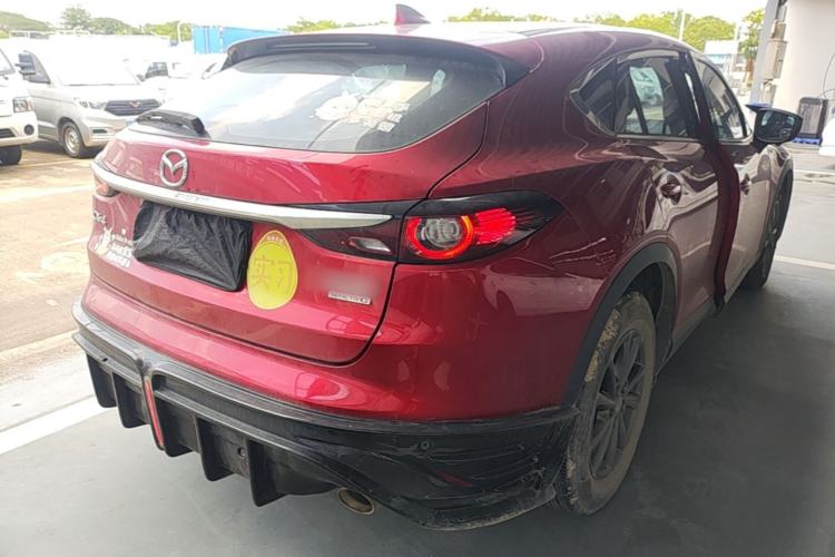 Used Mazda CX-4 2021 2.0L Automatic Two-Wheel Drive Blue Sky Dynamic Edition Rear Right 45 Deg