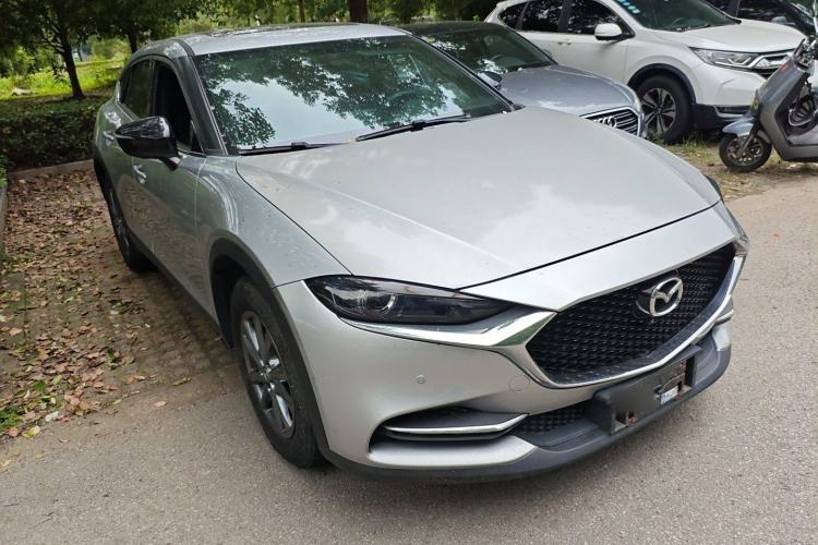 Used Mazda CX-4 2021 2.0L Automatic Two-Wheel Drive Blue Sky Exploration Edition Front Right 45 Deg
