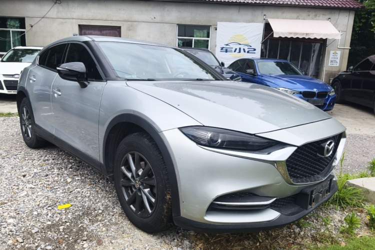 Used Mazda CX-4 2021 2.0L Automatic Two-Wheel Drive Blue Sky Dynamic Edition Front Right 45 Deg