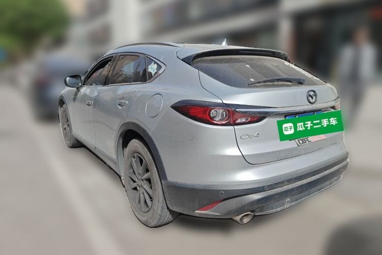 Used Mazda CX-4 2021 2.0L Automatic Two-Wheel Drive Blue Sky Luxury Edition Rear Left 45 Deg
