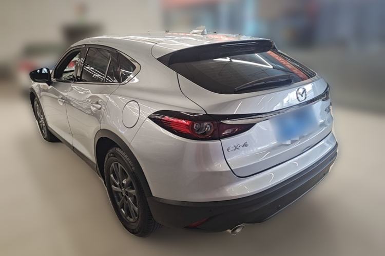 Used Mazda CX-4 2021 2.0L Automatic Two-Wheel Drive Blue Sky Dynamic Edition Rear Left 45 Deg