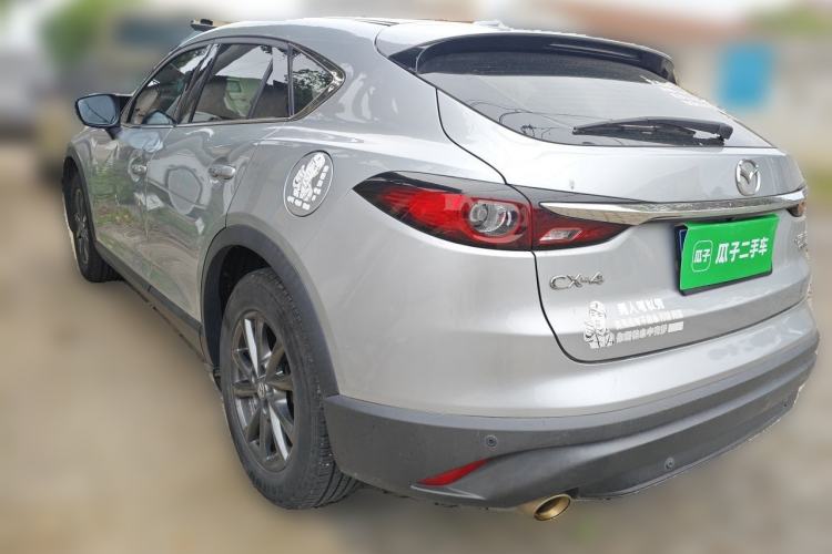 Used Mazda CX-4 2021 2.0L Automatic Two-Wheel Drive Blue Sky Dynamic Edition Rear Left 45 Deg