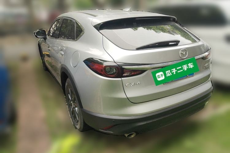 Used Mazda CX-4 2021 2.0L Automatic Two-Wheel Drive Blue Sky Exploration Edition Rear Left 45 Deg