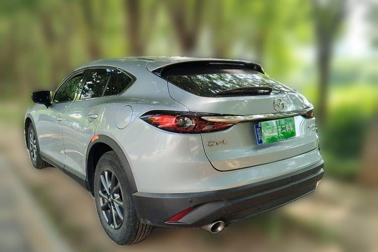 Used Mazda CX-4 2021 2.0L Automatic Two-Wheel Drive Blue Sky Dynamic Edition Rear Left 45 Deg