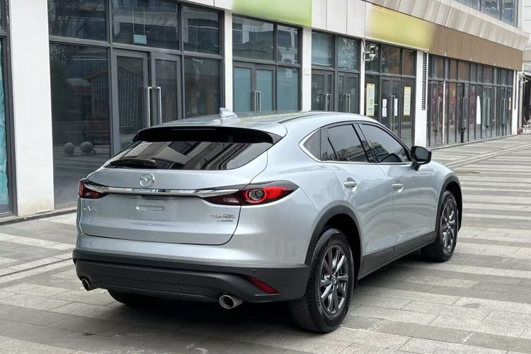 Used Mazda CX-4 2021 2.0L Automatic Two-Wheel Drive Blue Sky Dynamic Edition Rear Right 45 Deg