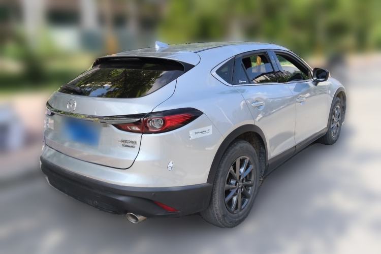 Used Mazda CX-4 2021 2.0L Automatic Two-Wheel Drive Blue Sky Dynamic Edition Rear Right 45 Deg