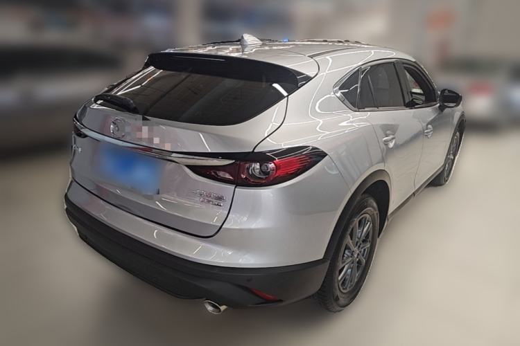 Used Mazda CX-4 2021 2.0L Automatic Two-Wheel Drive Blue Sky Dynamic Edition Rear Right 45 Deg